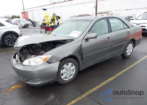 2003 Toyota Camry Le z USA, uszkodzony, nr VIN 4T1BE32K53U668573